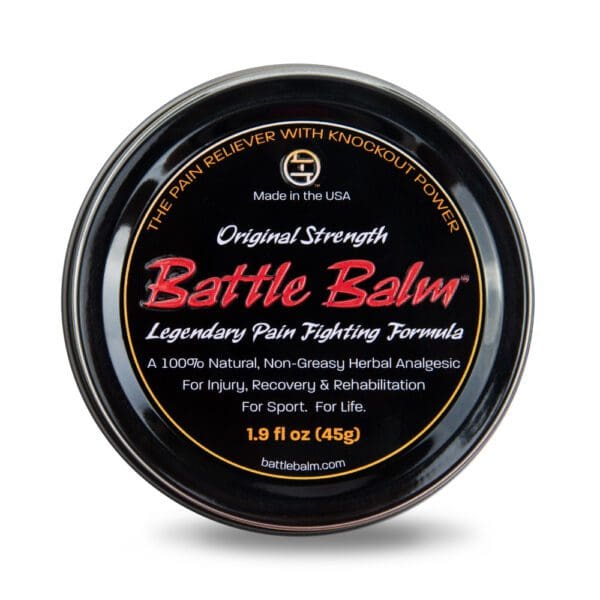 A tin of BATTLE BALM ORIGINAL STRENGTH (1.9 FL OZ) on a white background.