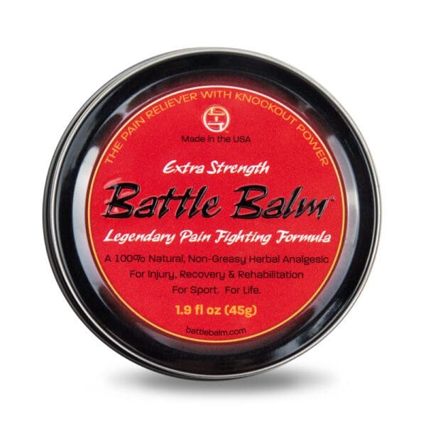 A tin of BATTLE BALM EXTRA STRENGTH (1.9 FL OZ) on a white background.