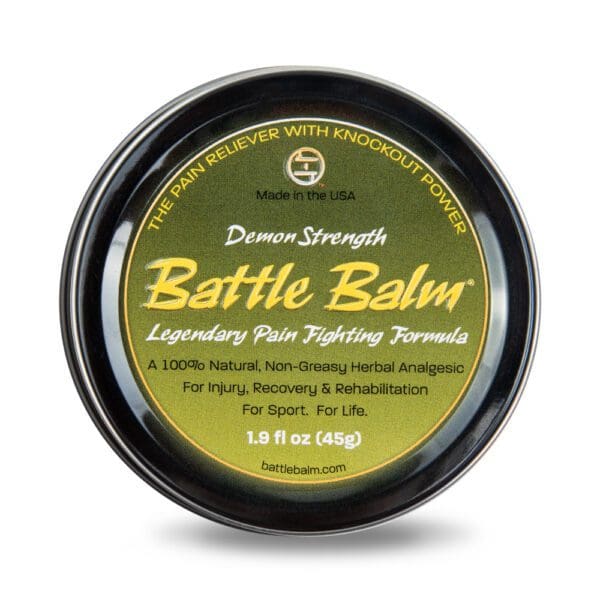 A tin of BATTLE BALM DEMON STRENGTH (1.9 FL OZ).