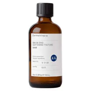 A bottle of BAI BI DING SOFTENING TINCTURE - DERMATOLOGY M on a white background.