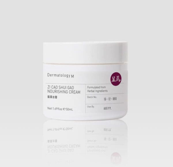 A jar of ZI CAO SHUI GAO NOURISHING CREAM (50ML) - DERMATOLOGY M on a white background.