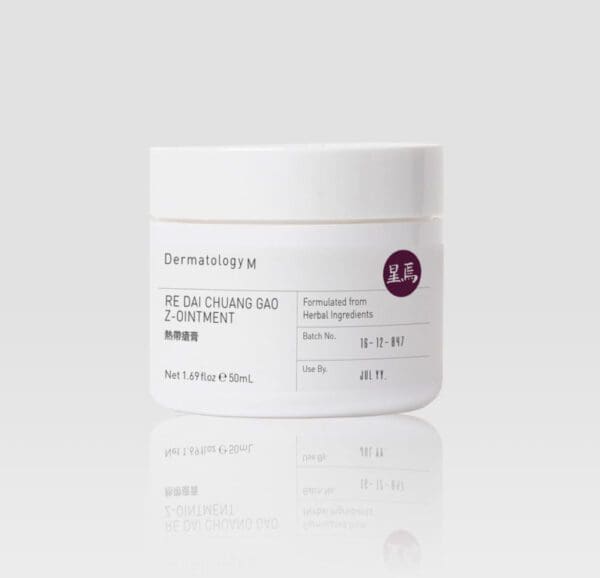 A jar of RE DAI CHUANG GAO Z-OINTMENT - DERMATOLOGY M on a white background.