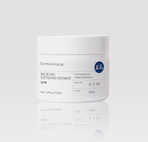 A jar of BAI BI GAO SOFTENING OINTMENT - DERMATOLOGY M on a white background.