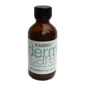 A bottle of HERBALMINE LOTION (2 OZ) (DERMCARE) on a white background.