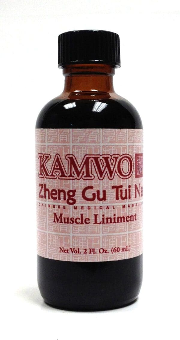 A bottle of MUSCLE LINIMENT (2.0 FL OZ) (ZHENG GU TUI NA).