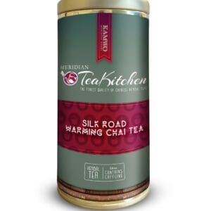A tin of MERIDIAN TEA KITCHEN SILK ROAD WARMING CHAI TEA (5.0 OZ) with a label on it.