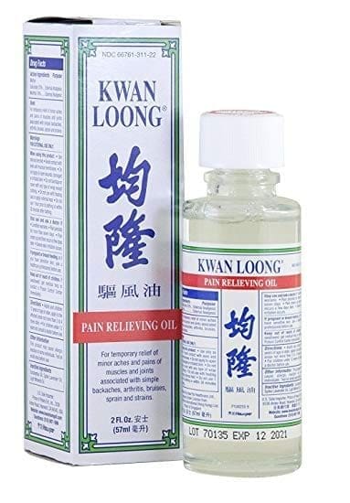 Image of Kwan Loong Pain Relieving Oil, a 2 fluid ounce bottle, placed next to its box packaging. The box displays detailed product information and the expiration date reads 12/2021.