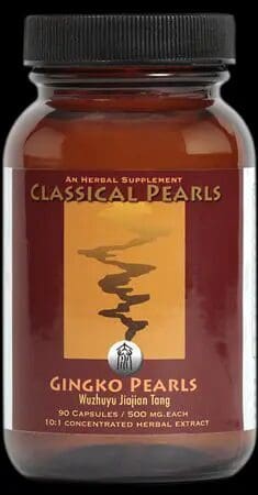 A bottle of Classical Pearls Gingko Pearls herbal supplement, containing 90 capsules with 500 mg each, labeled "Wuzhuyujiajian Tang." The label also mentions "10:1 concentrated herbal extract.